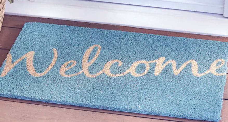 welcome mat in front of door