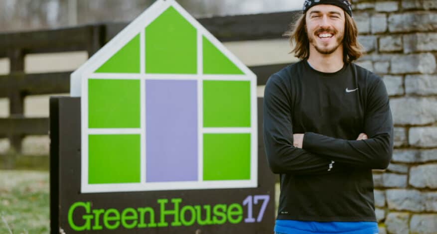 josh standing in front of GreenHouse17 sign