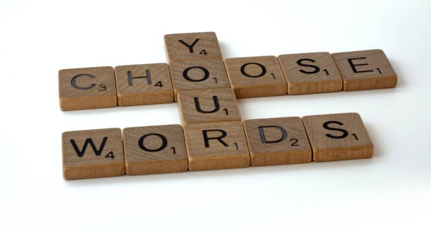 spells choose your words with scrabble pieces