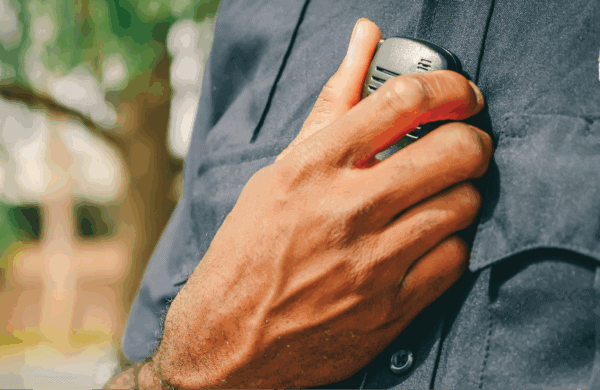 police officer holding radio