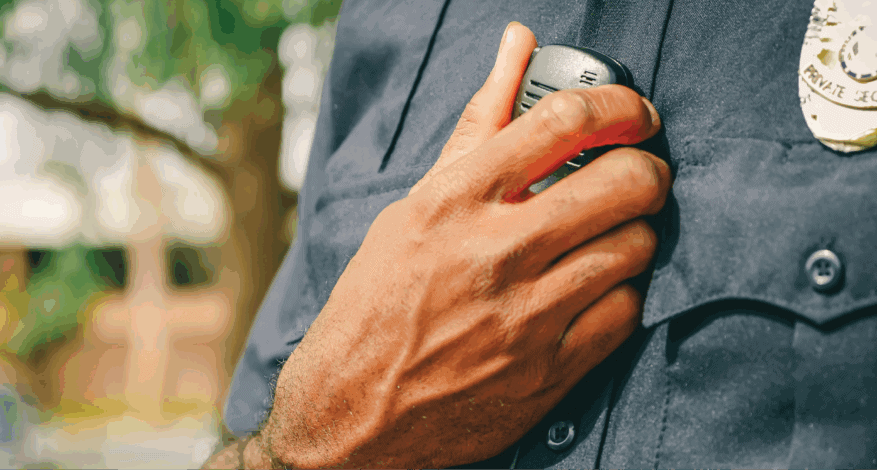 police officer holding radio
