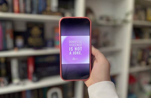 phone held up with nnedv statement