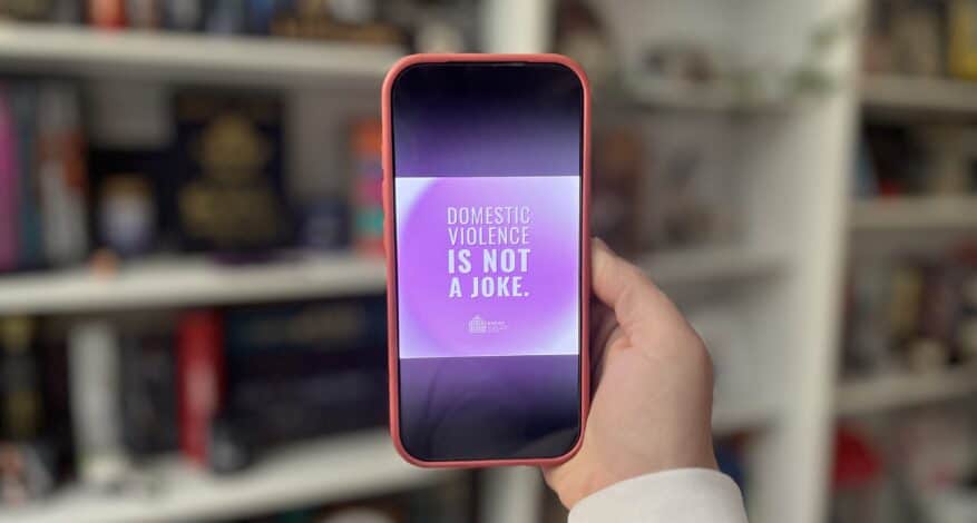 phone held up with nnedv statement